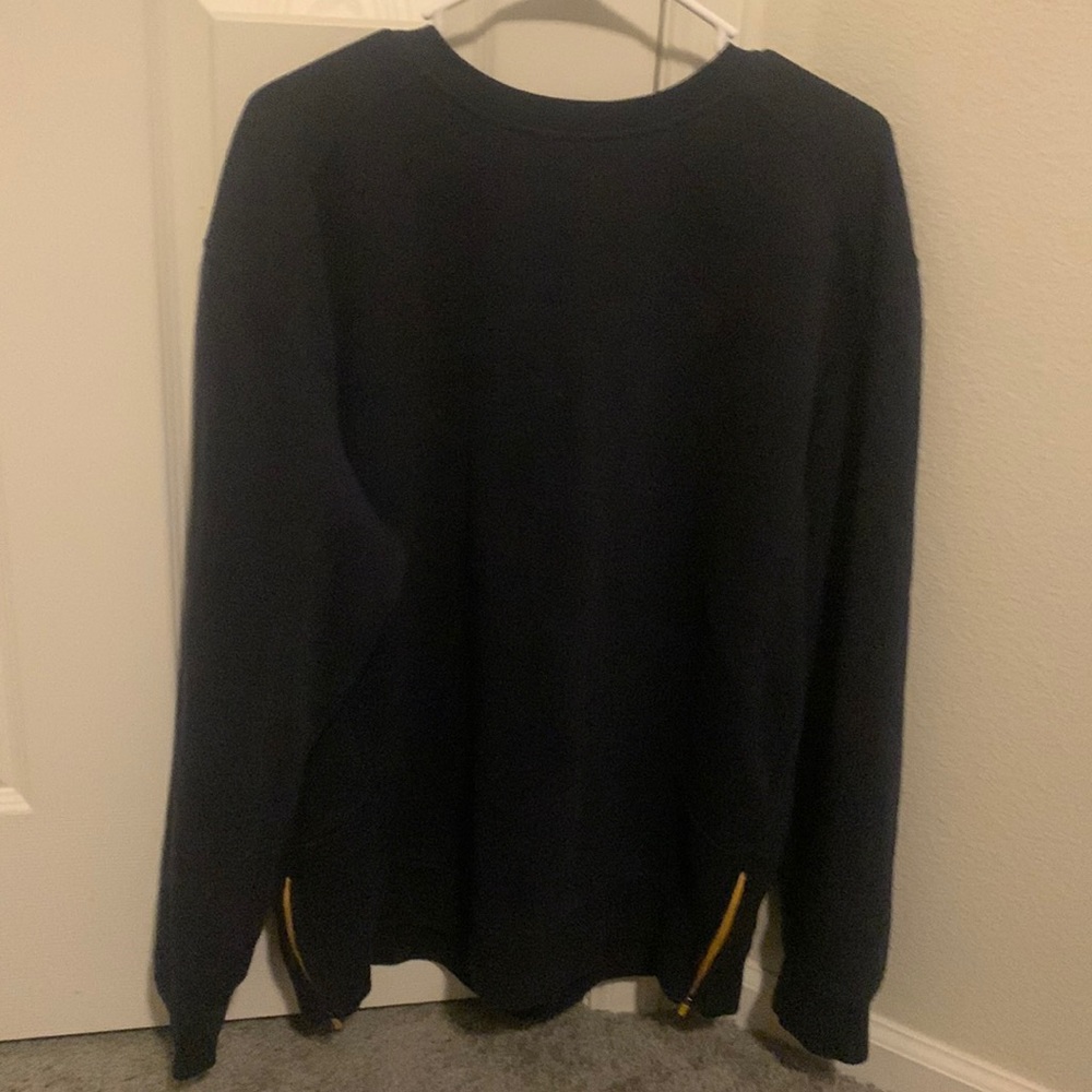 Crew neck sweatshirt with zip up sides